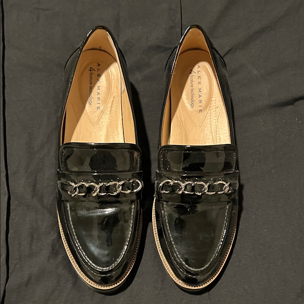 Alex Marie Glossy Black Loafers with Chain Accent